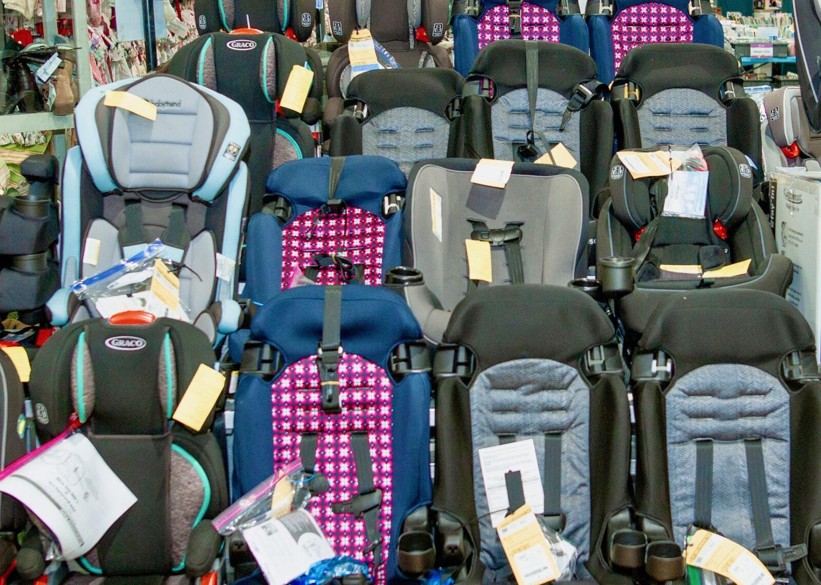 Car seats lined up for sale