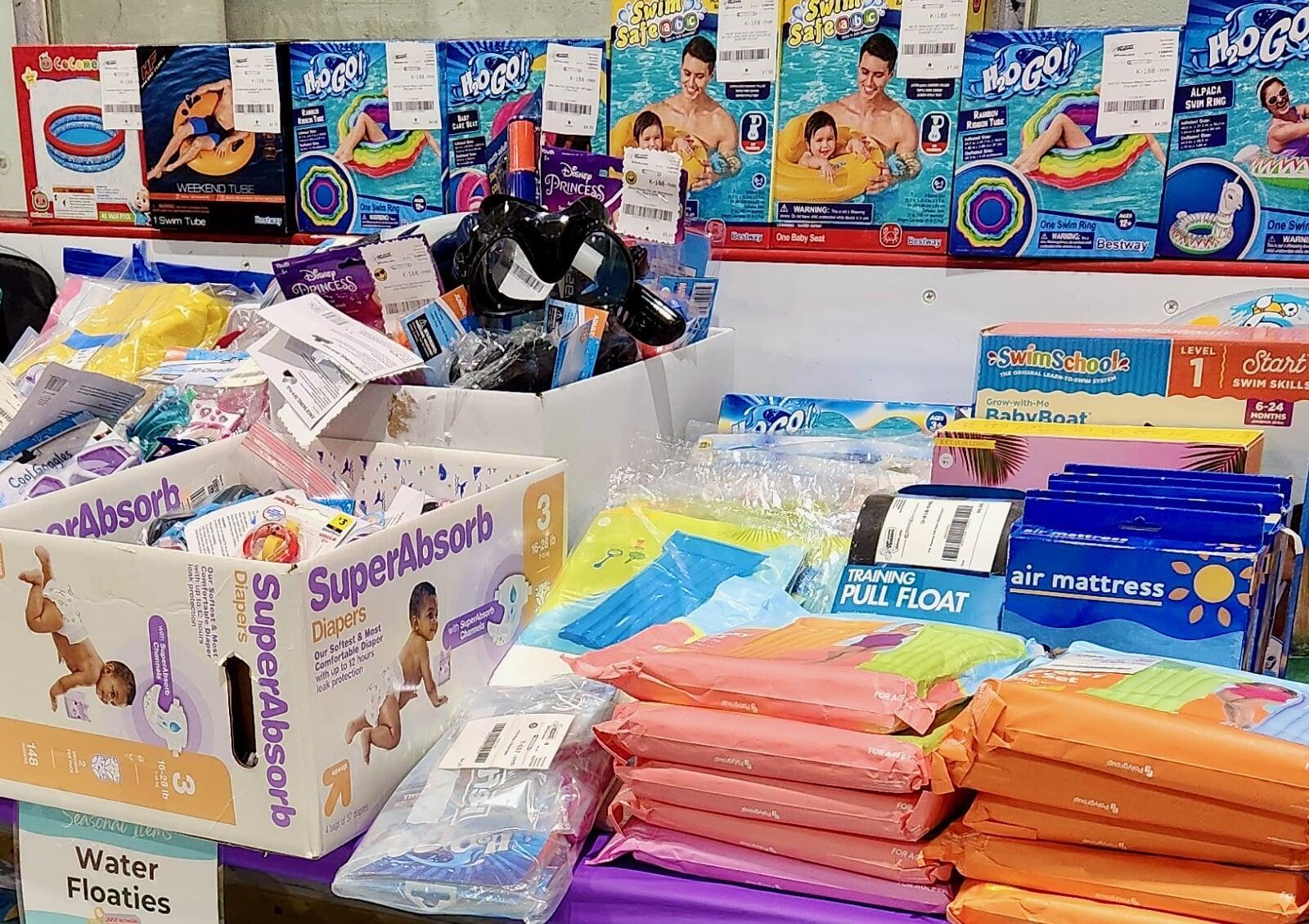 Water floats and toys displayed on a table
