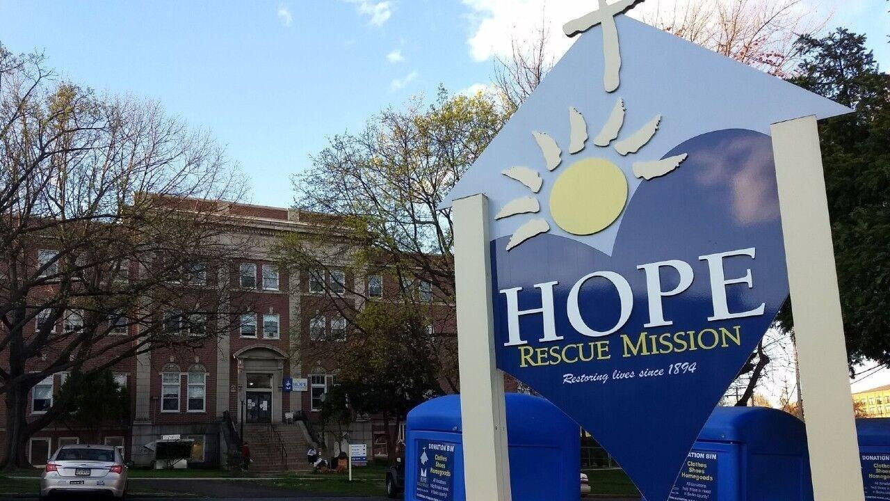 Hope Rescue Mission sign and their building in the background