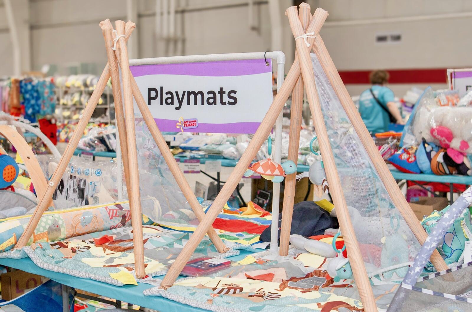 Infant playmats set up on a table